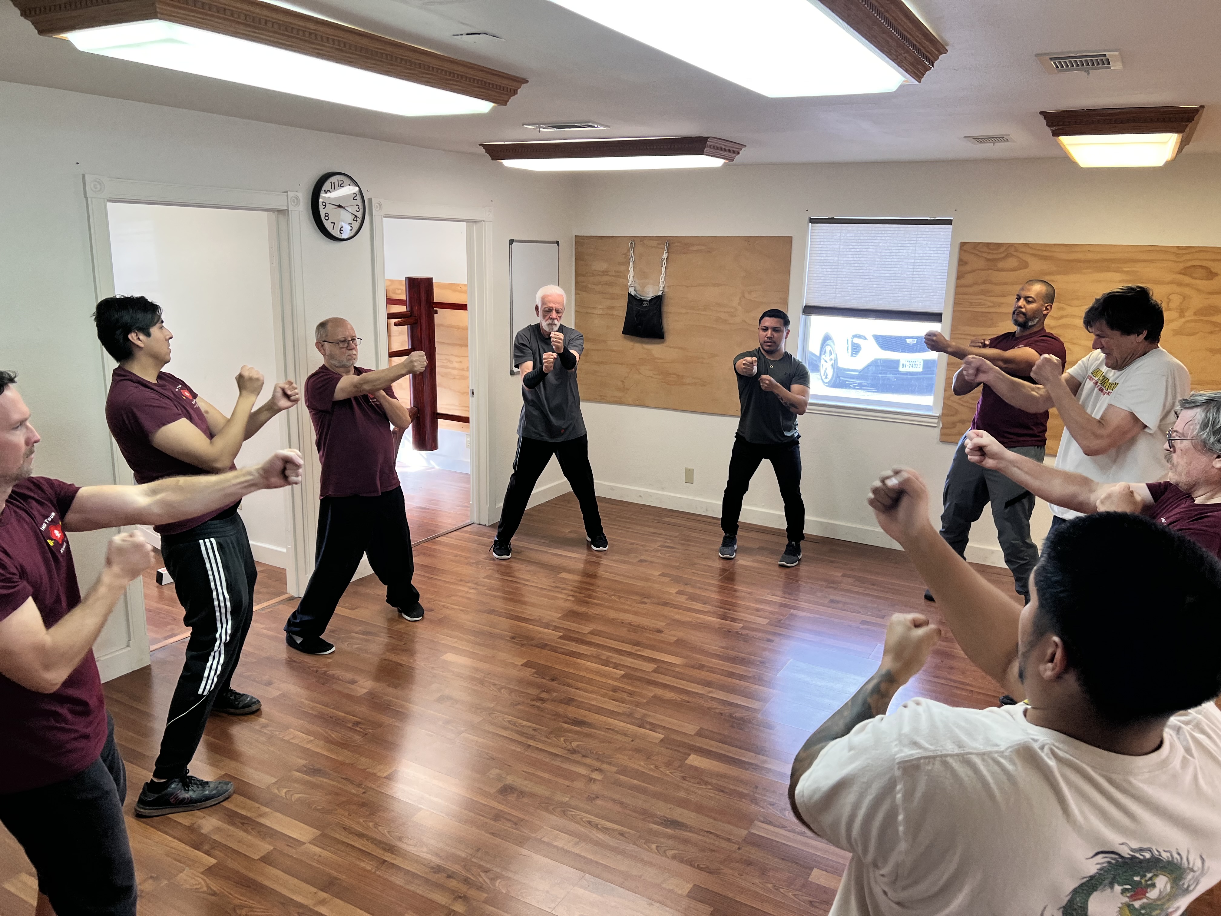 Adults over 50 practicing Wing Chun Kung Fu in a Georgetown class
